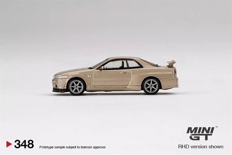 Mô hình xe Nissan Skyline GT-R (R34) M-Spec Silica Breath Gold tỉ lệ 1:64 MiniGT MGT00348