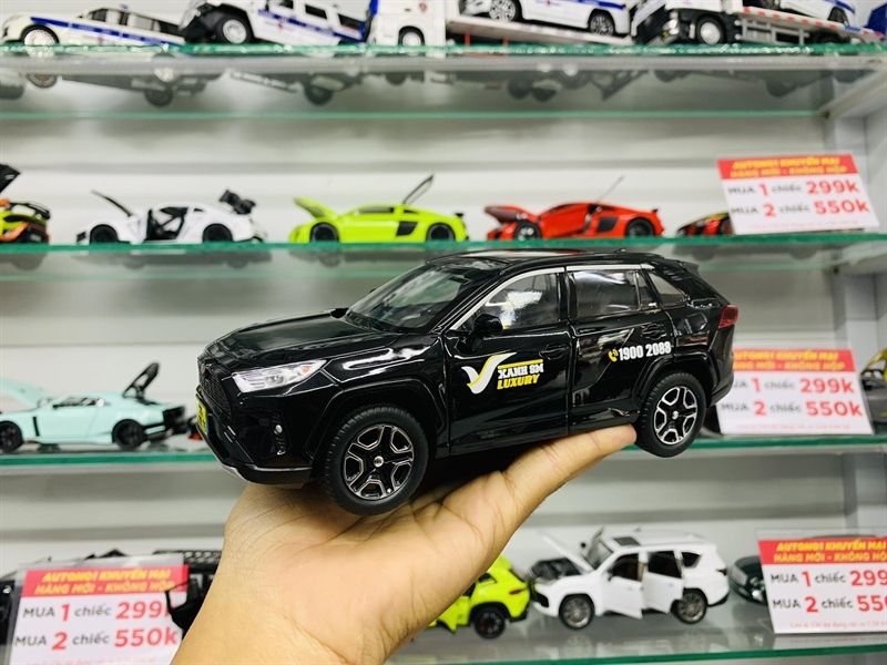 Mô hình xe độ dịch vụ taxi Toyota RAV4 tem Xanh SM Đen full open - full kính - có âm thanh - đèn tỉ lệ 1:22 Alloy model Autono1 OT561