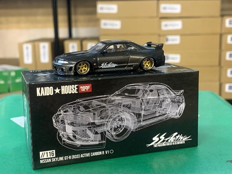 Mô hình xe Nissan GT-R (R33) Active Carbon R tỉ lệ 1:64 Kaido House x MiniGT KHMG116