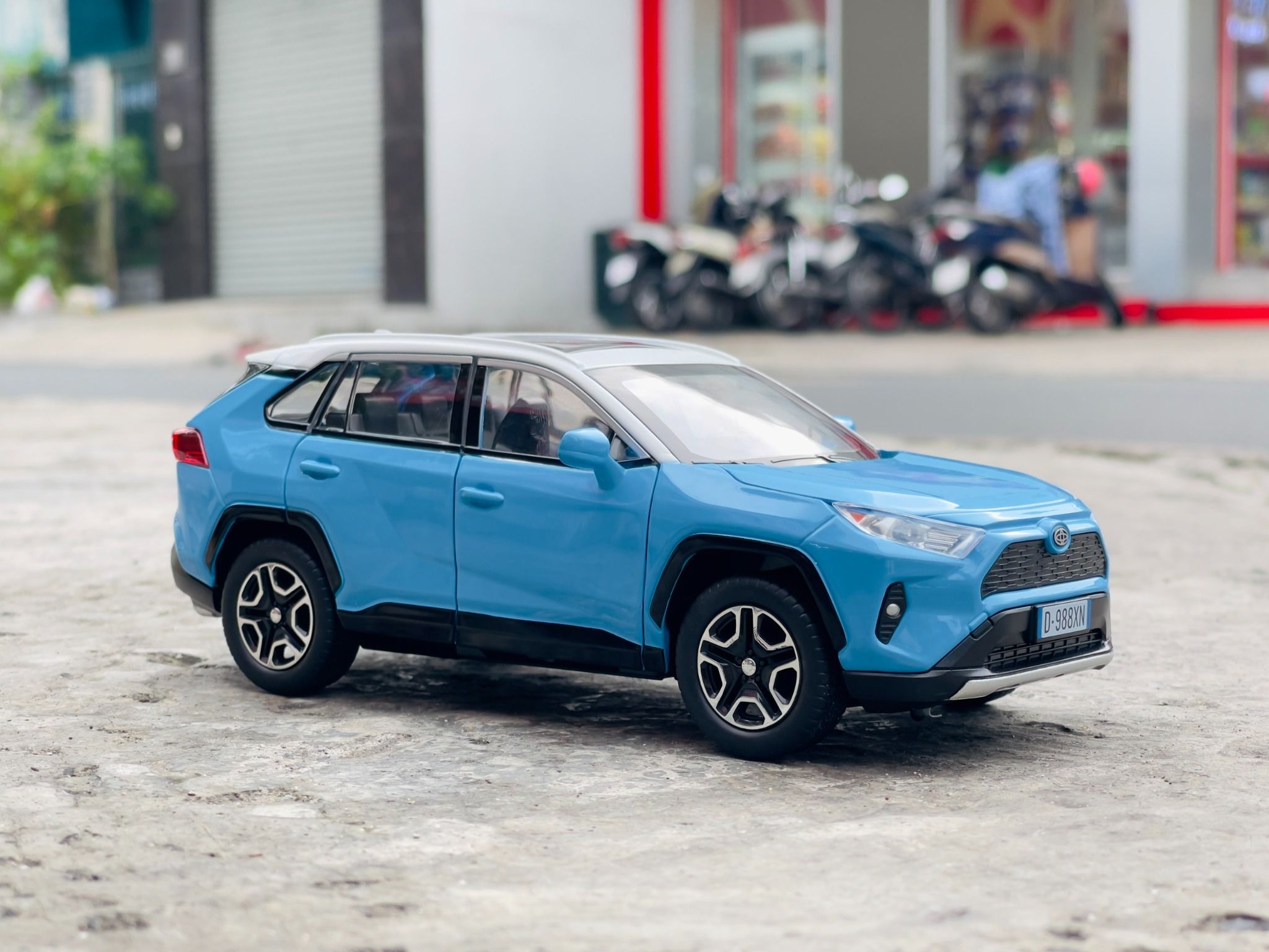 Mô hình xe ô tô Toyota RAV4 full open - full kính - có âm thanh - đèn tỉ lệ 1:22 Jiaye Model OT503