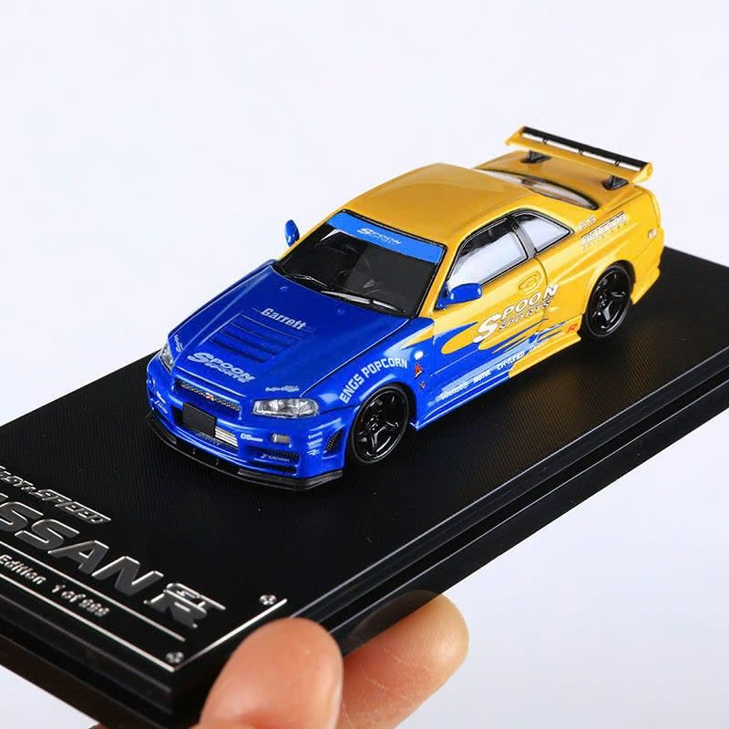 Mô hình xe Nissan Skyline GTR R34 Spoon/Falken painted có hộp mica tỉ lệ 1:64 Fast Speed FS-R34-6