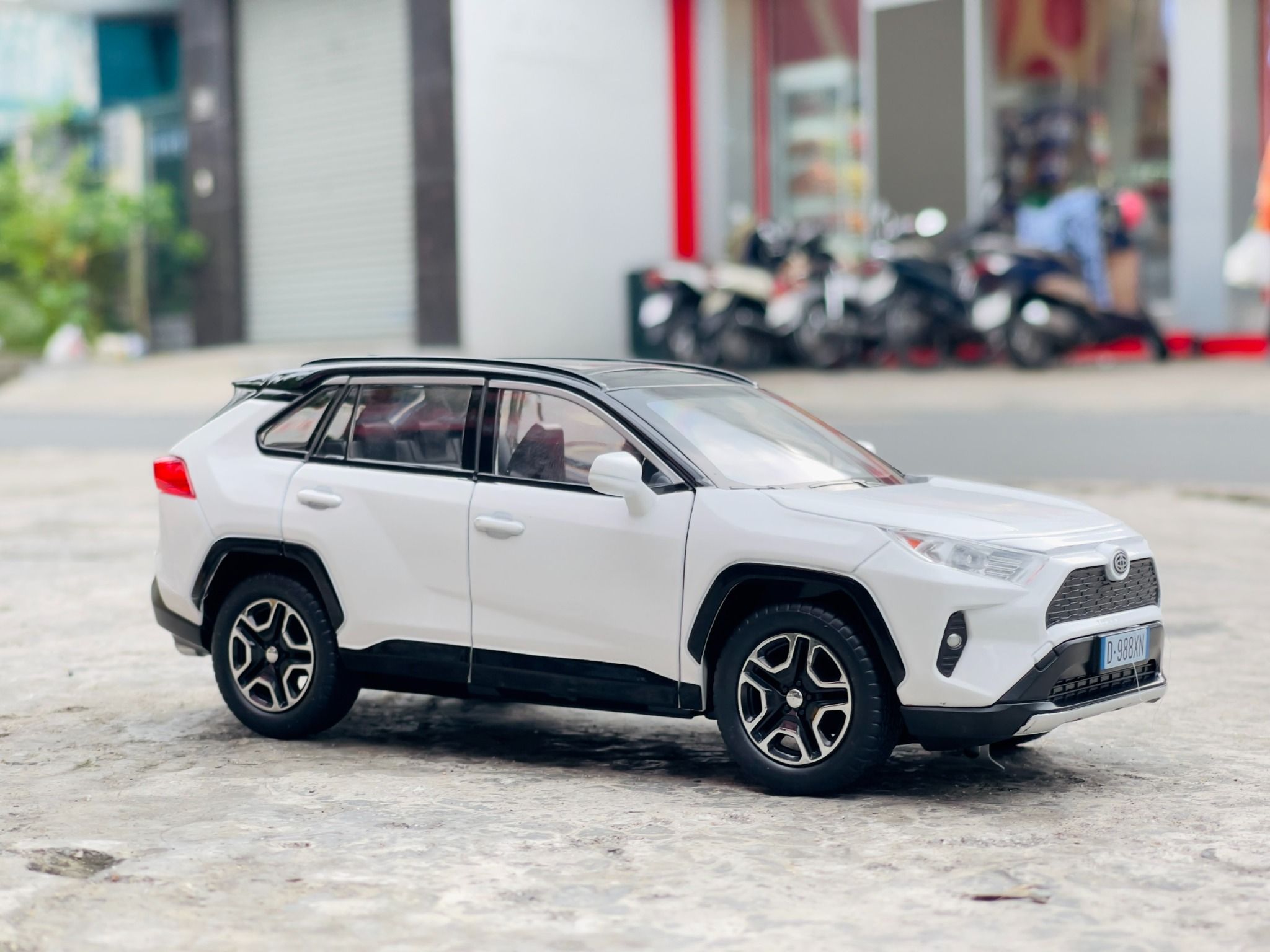 Mô hình xe ô tô Toyota RAV4 full open - full kính - có âm thanh - đèn tỉ lệ 1:22 Jiaye Model OT503
