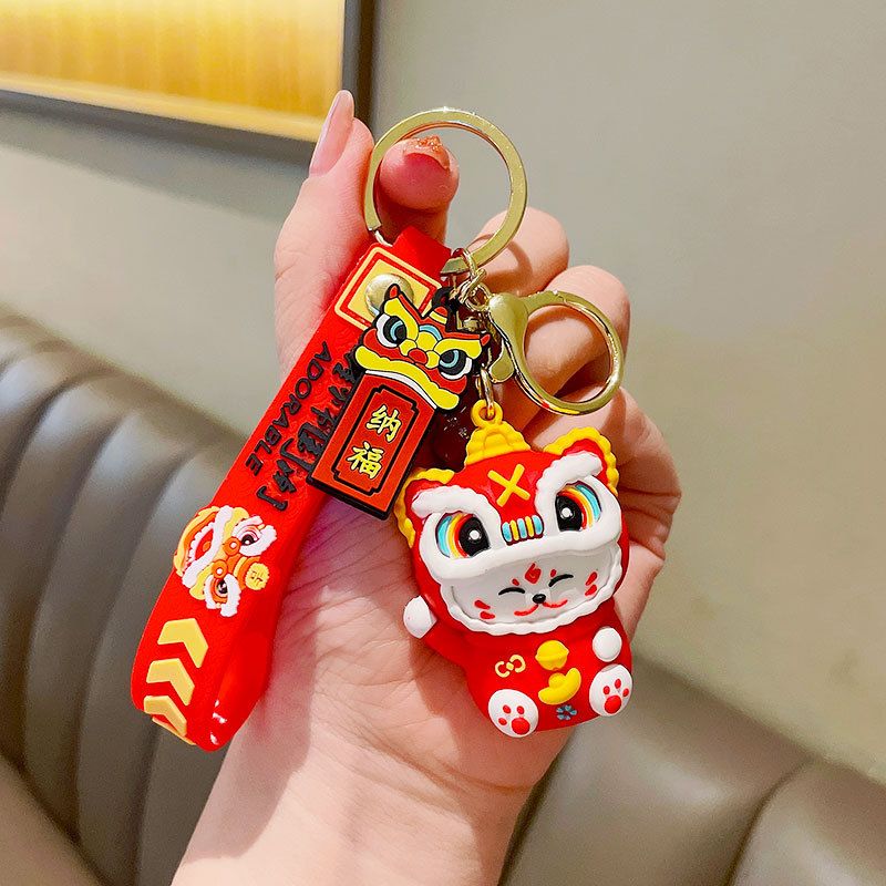 Móc khóa nhựa dẻo - silicon mèo thần tài đội đầu lân MK017