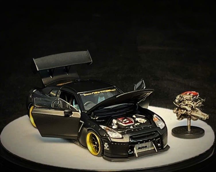 Mô hình xe cao cấp Nissan GTR R35 Rocket Pandem black full open Limited 999pcs tỉ lệ 1:64 PGM PGM-640702
