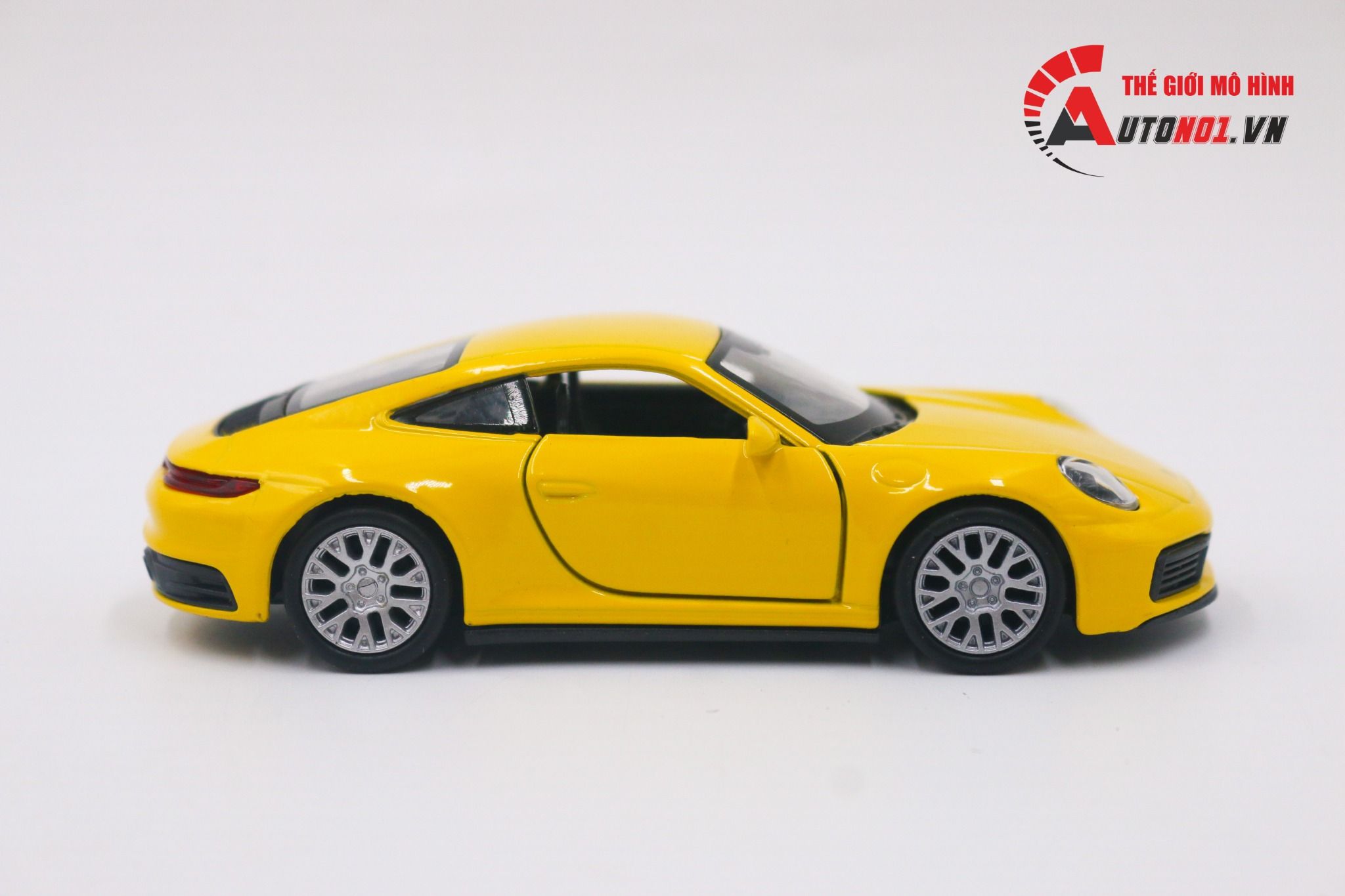 Mô hình xe Porsche 911 Carrera 4s Yellow 1:36 Welly OT011
