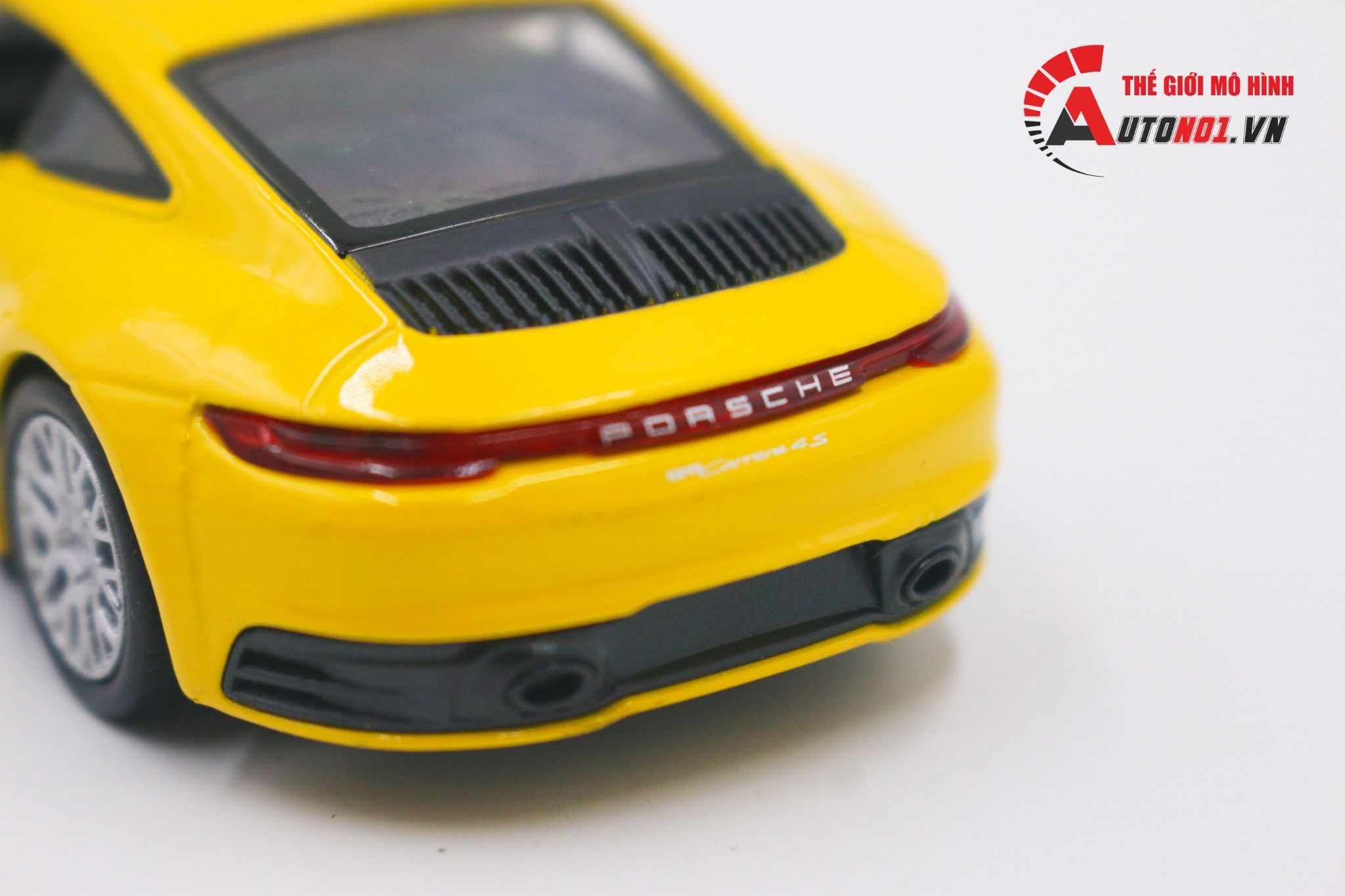 Mô hình xe Porsche 911 Carrera 4s Yellow 1:36 Welly OT011