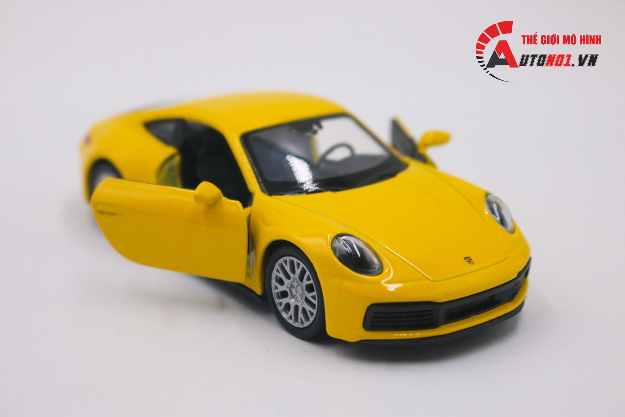 Mô hình xe Porsche 911 Carrera 4s Yellow 1:36 Welly OT011