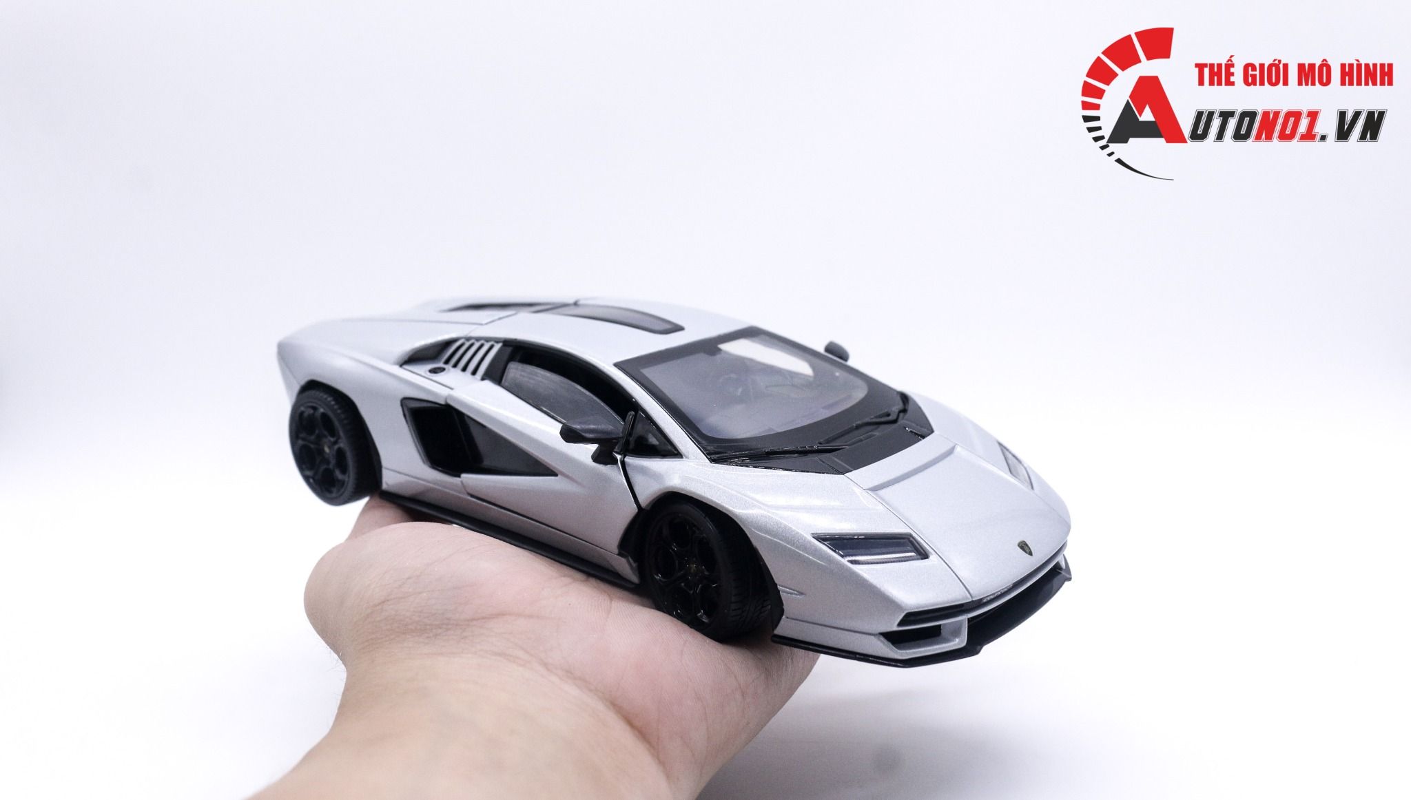 Mô hình xe Lamborghini Countach LPI800-4 đánh lái được full kính tỉ lệ 1:24 Welly OT021