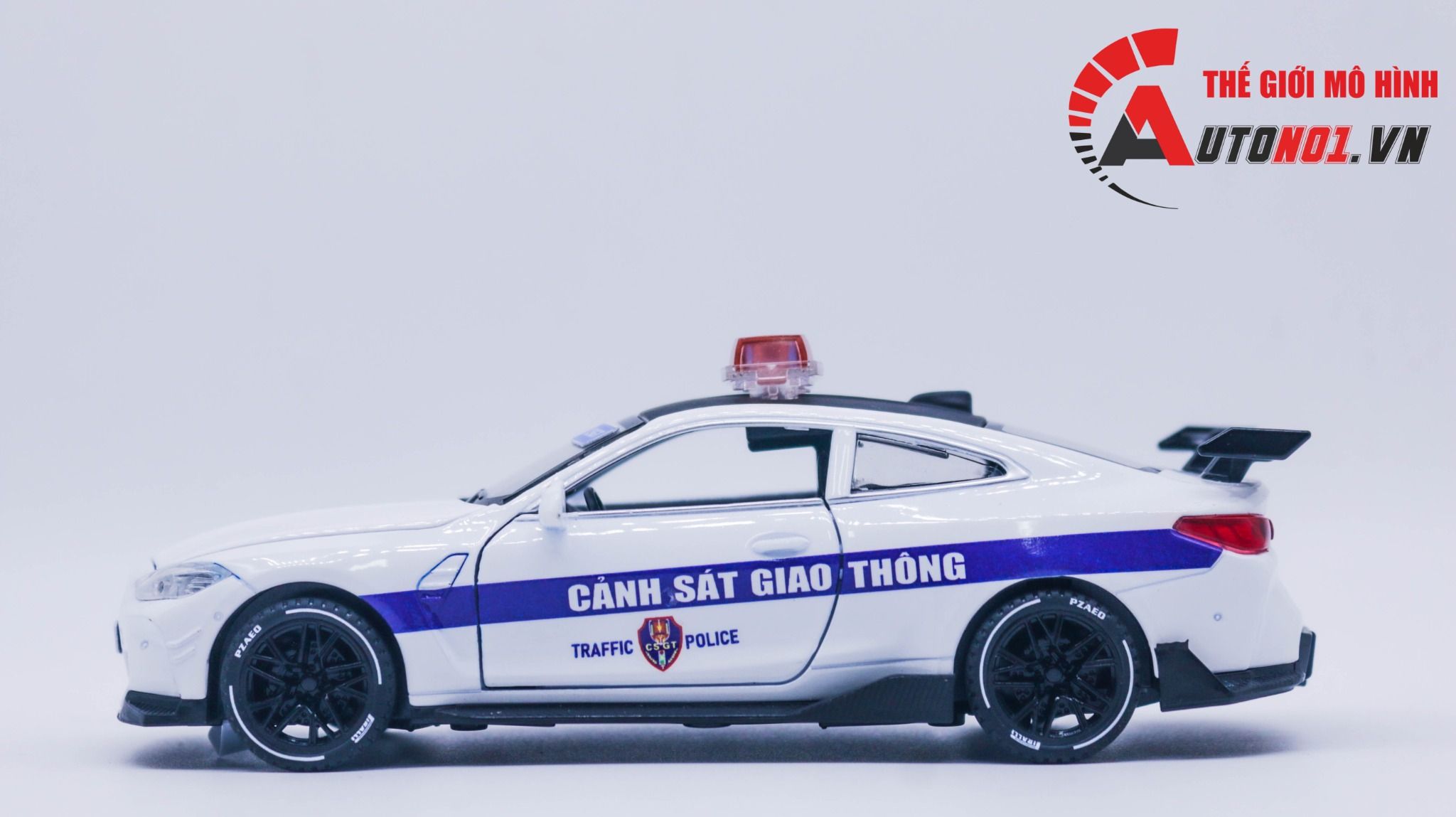 Mô hình xe ô tô độ CSGT BMW M4 full open có đèn có âm thanh tỉ lệ 1:32 Alloy OT397