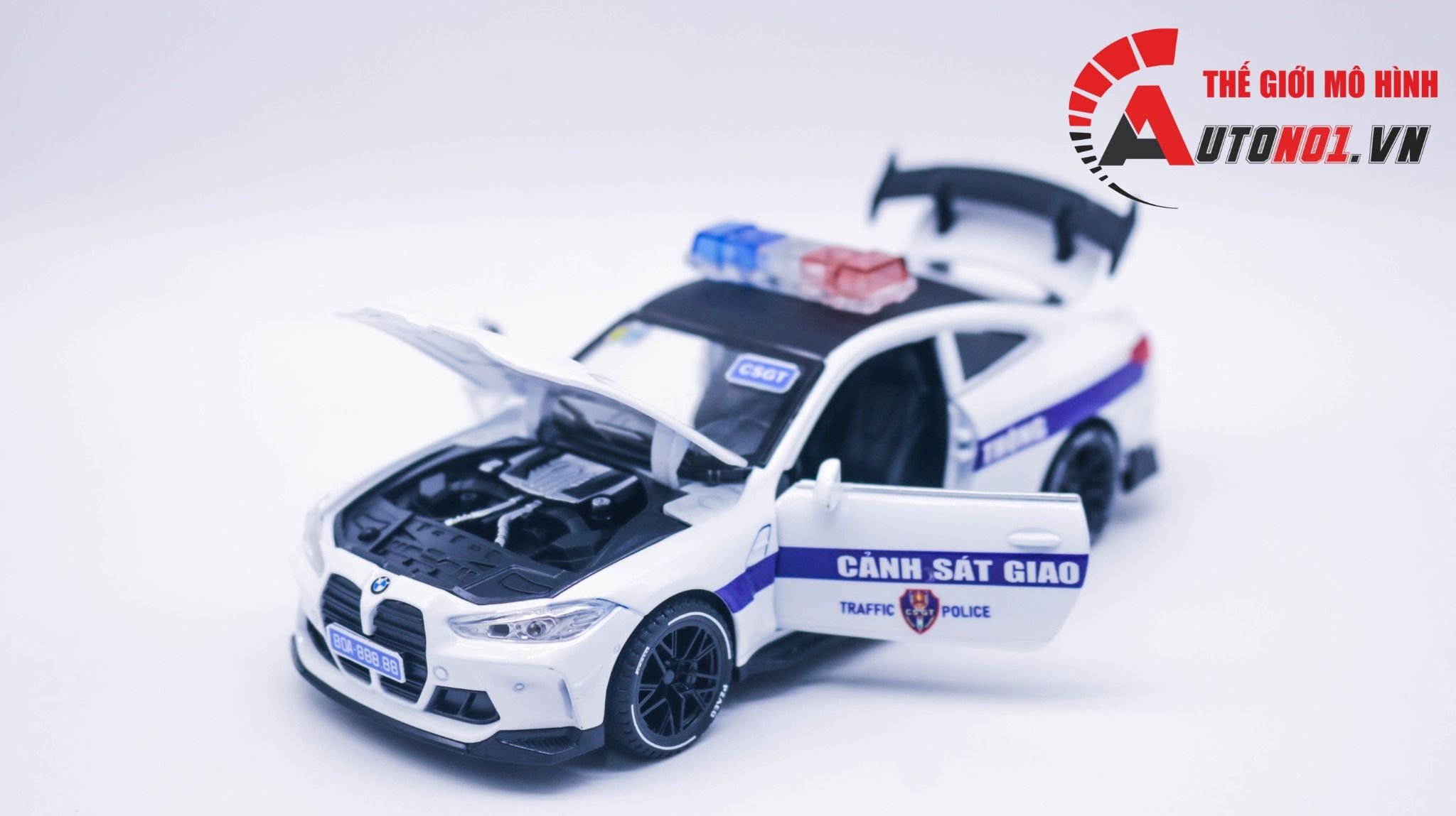  Mô hình xe độ BMW M4 độ CSGT full open có đèn có âm thanh tỉ lệ 1:32 Alloy OT397 