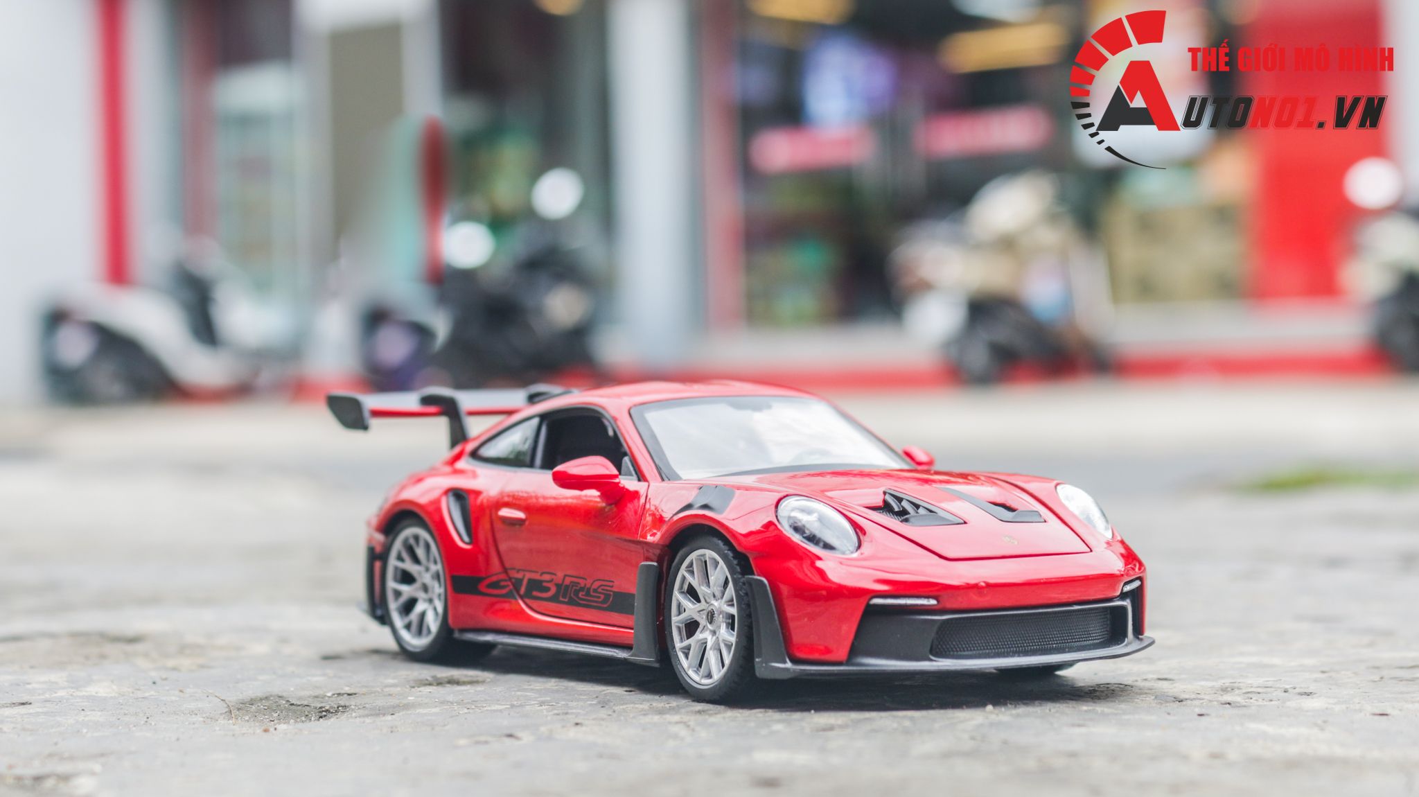 Mô hình xe Porsche 911 (992) GT3 RS tỉ lệ 1:24 Welly OT456
