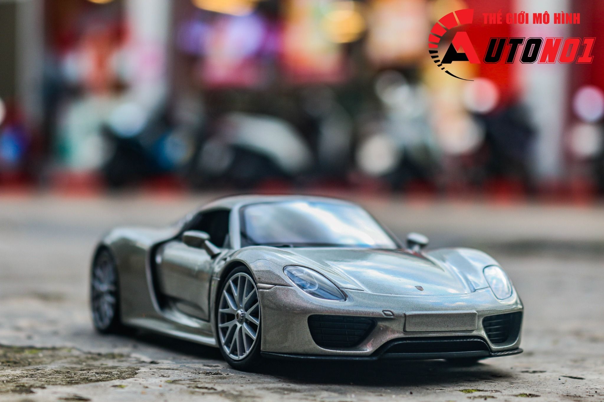 Mô hình xe Porsche 918 Spyder mở được 2 cửa 1:24 Welly OT558