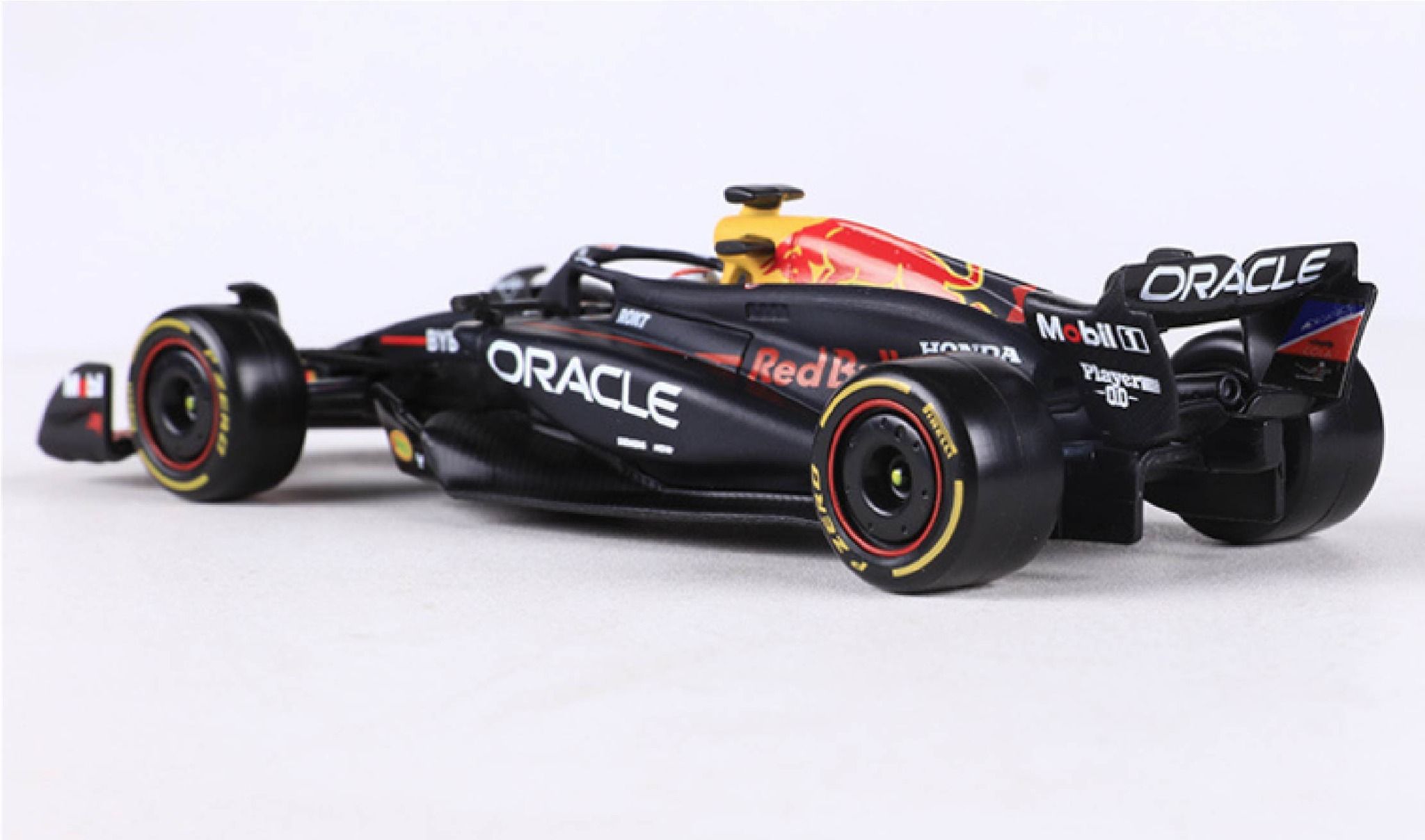 Mô hình xe đua Red Bull RB20 Formula F1 có Fig và hộp mica tỉ lệ 1:43 Bburago OT43017
