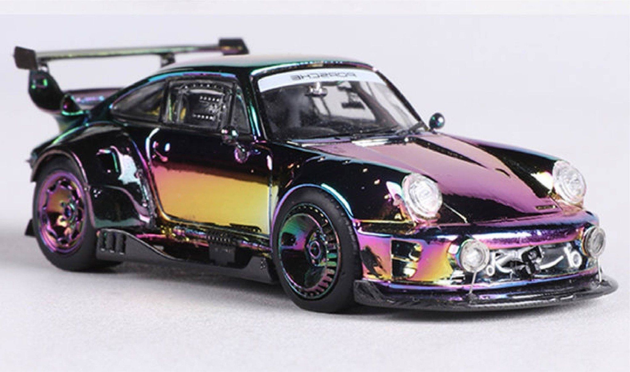 Mô hình xe Porsche RWB 964-993 tỉ lệ 1:64 có đế và hộp mica DCM Model