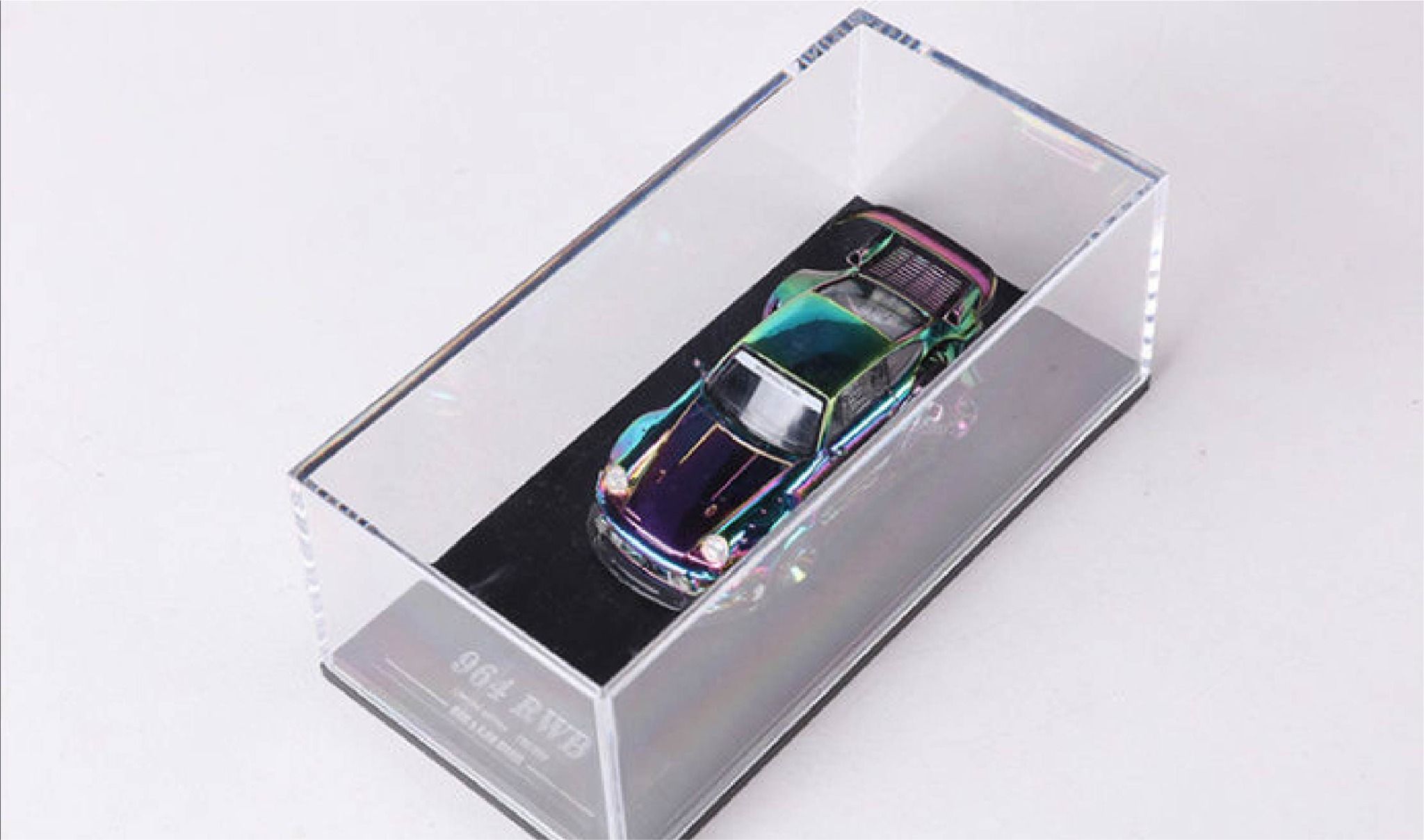 Mô hình xe Porsche RWB 964-993 tỉ lệ 1:64 có đế và hộp mica DCM Model