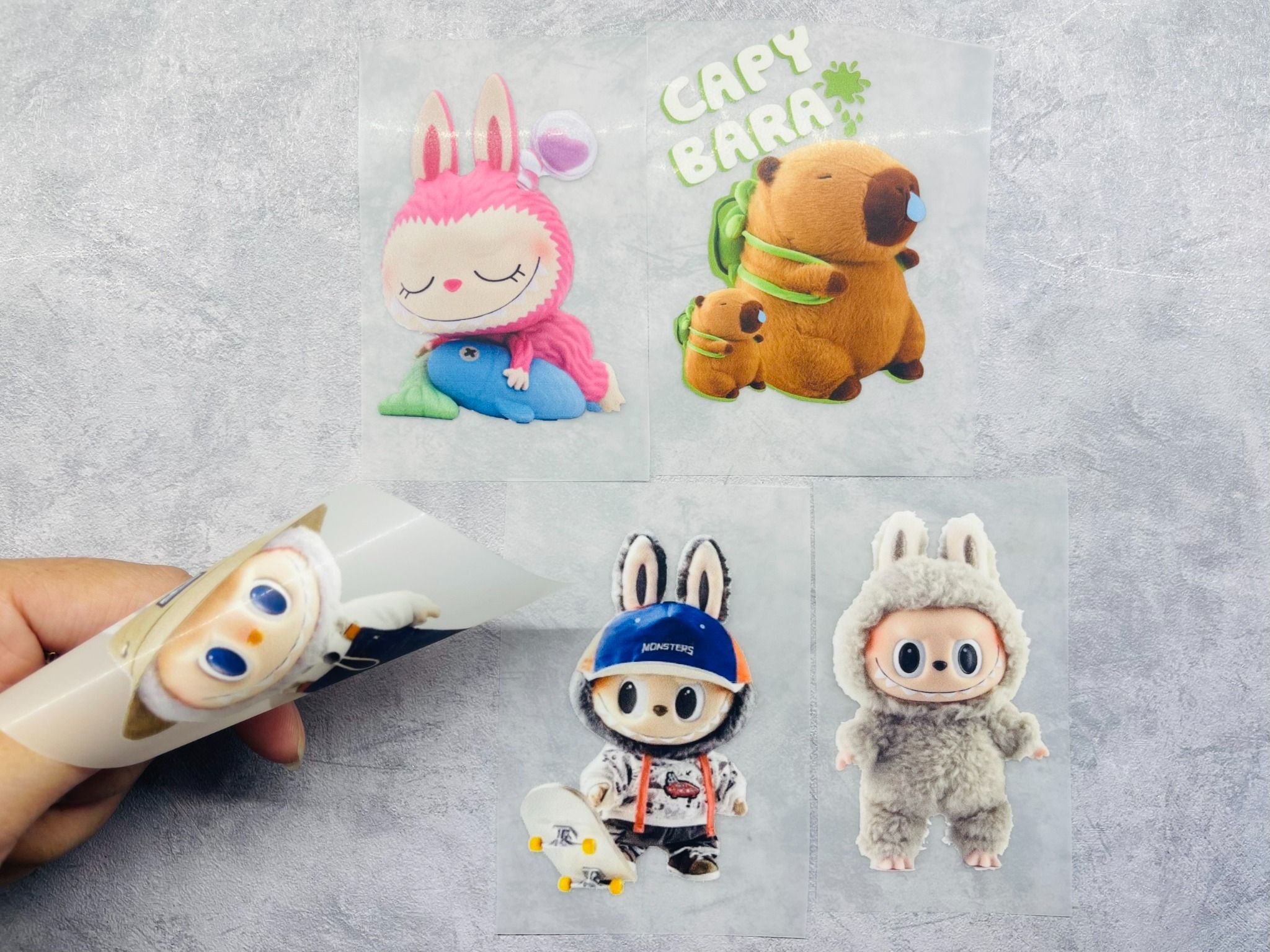 Sticker PET in chuyển nhiệt - hình ủi lên vải - nón - áo - quần Labubu Capybara Autono1 PE002