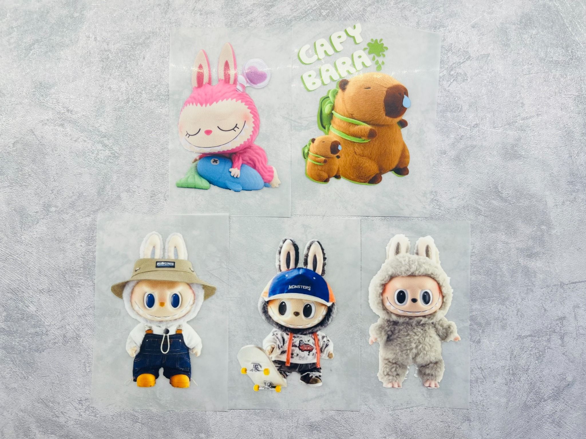 Sticker PET in chuyển nhiệt - hình ủi lên vải - nón - áo - quần Labubu Capybara Autono1 PE002
