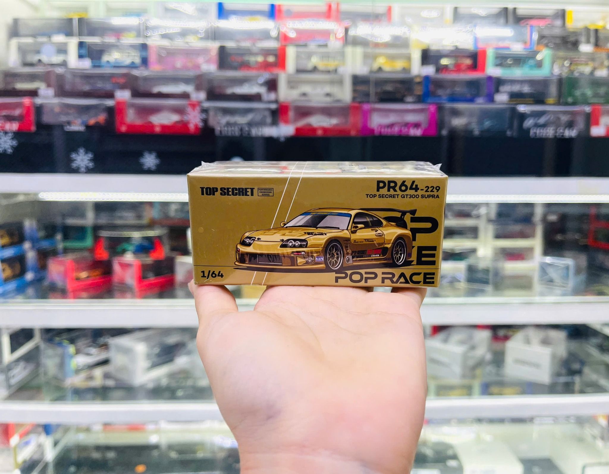 Mô hình xe Toyota Supra (A80) Top Secret GT-300 Top Secret Gold tỉ lệ 1:64 Poprace PR640229