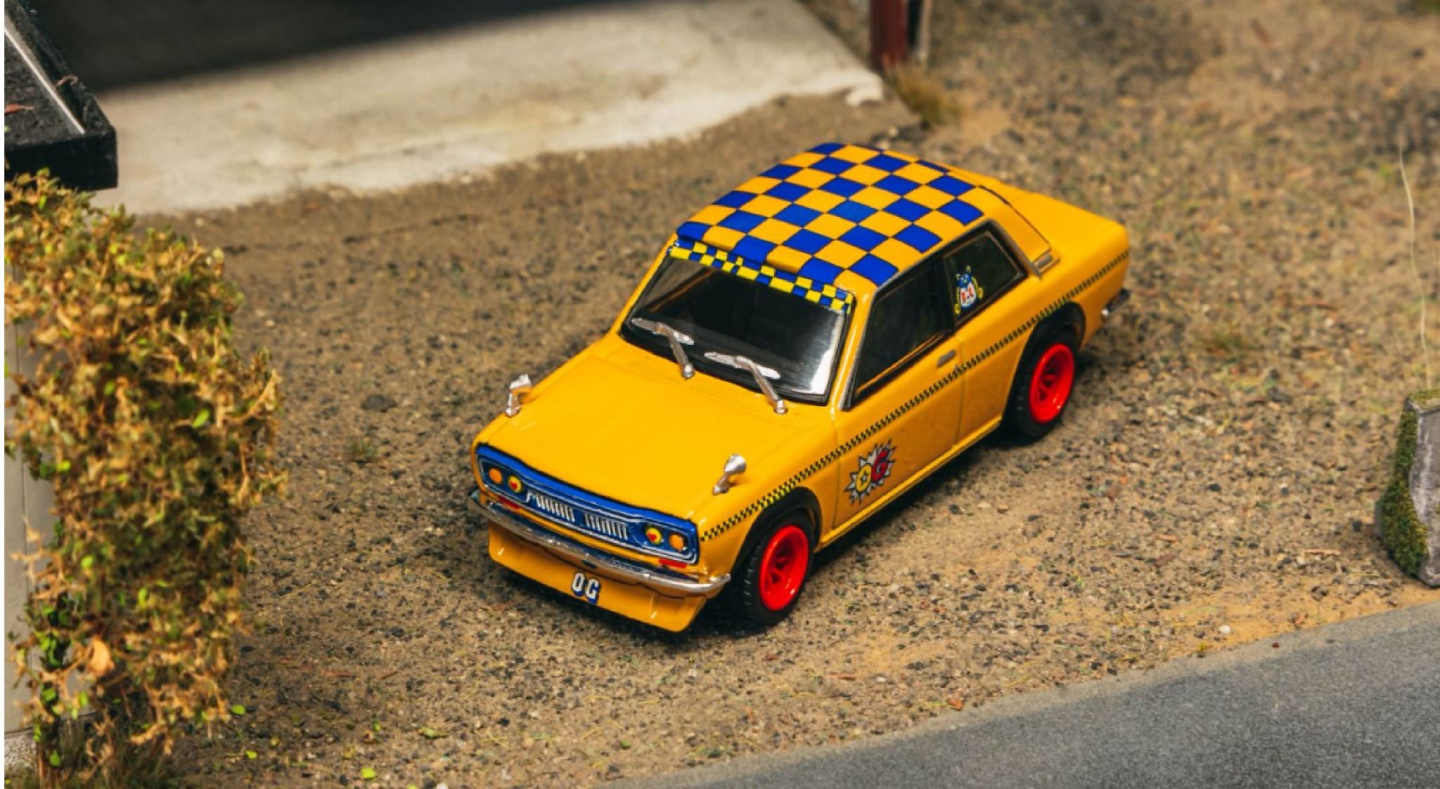 Mô hình xe Datsun 510 Tarmac tỉ lệ 1:64 T64-052-OG