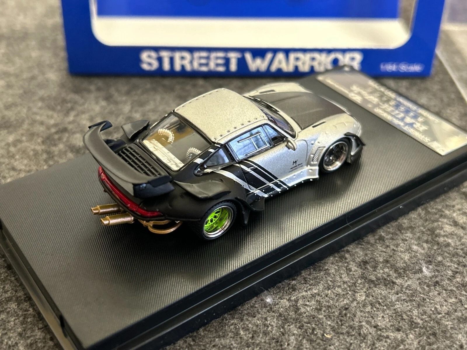 Mô hình xe Porsche Rauth Welt RWB 993 GT wipe body silver - carbon rear wing tỉ lệ 1:64 Street Weapon OT64449