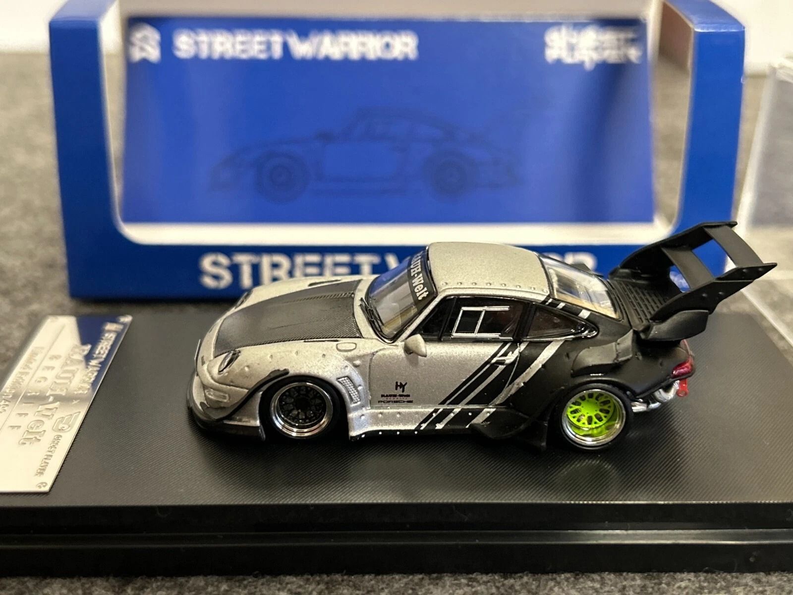 Mô hình xe Porsche Rauth Welt RWB 993 GT wipe body silver - carbon rear wing tỉ lệ 1:64 Street Weapon OT64449