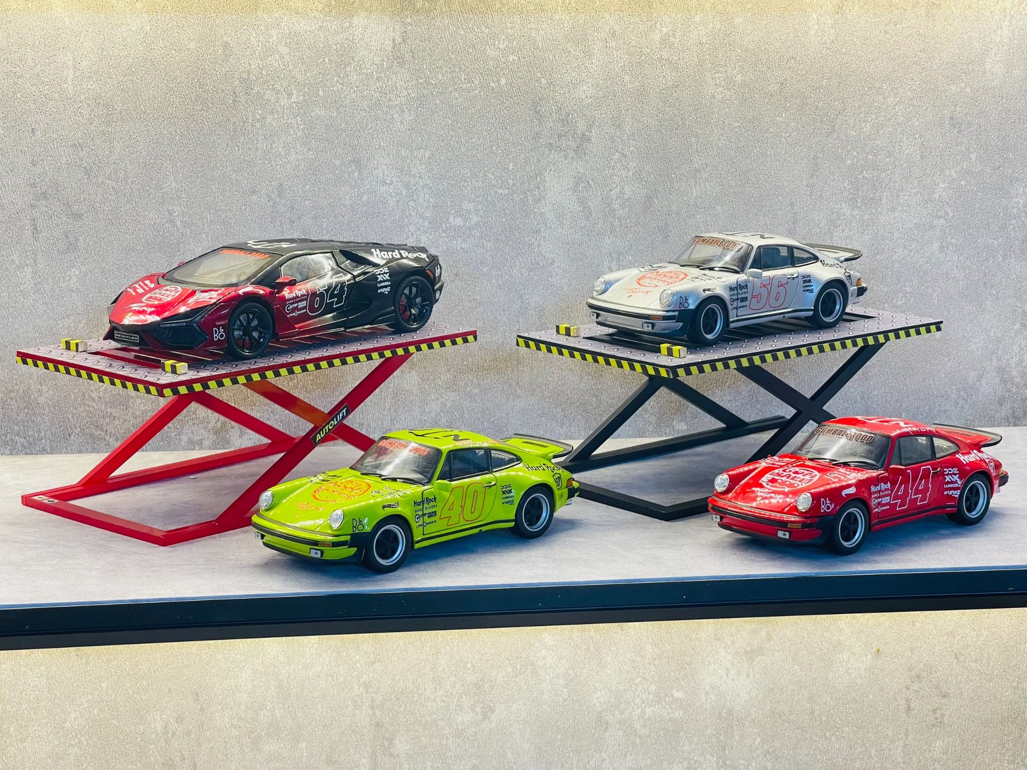 Mô hình xe custom Porsche 911 (930) Turbo Silver Gumball3000 tỉ lệ 1:24 Welly DO24015