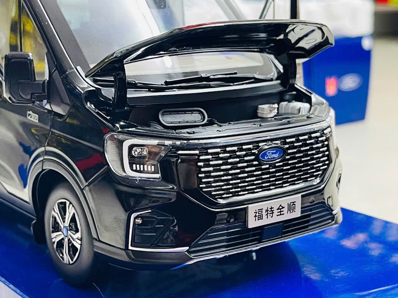 Mô hình xe khách 9 chỗ Ford Transit 2024 full open - đánh lái được tỉ lệ 1:18 Paudi OT18020