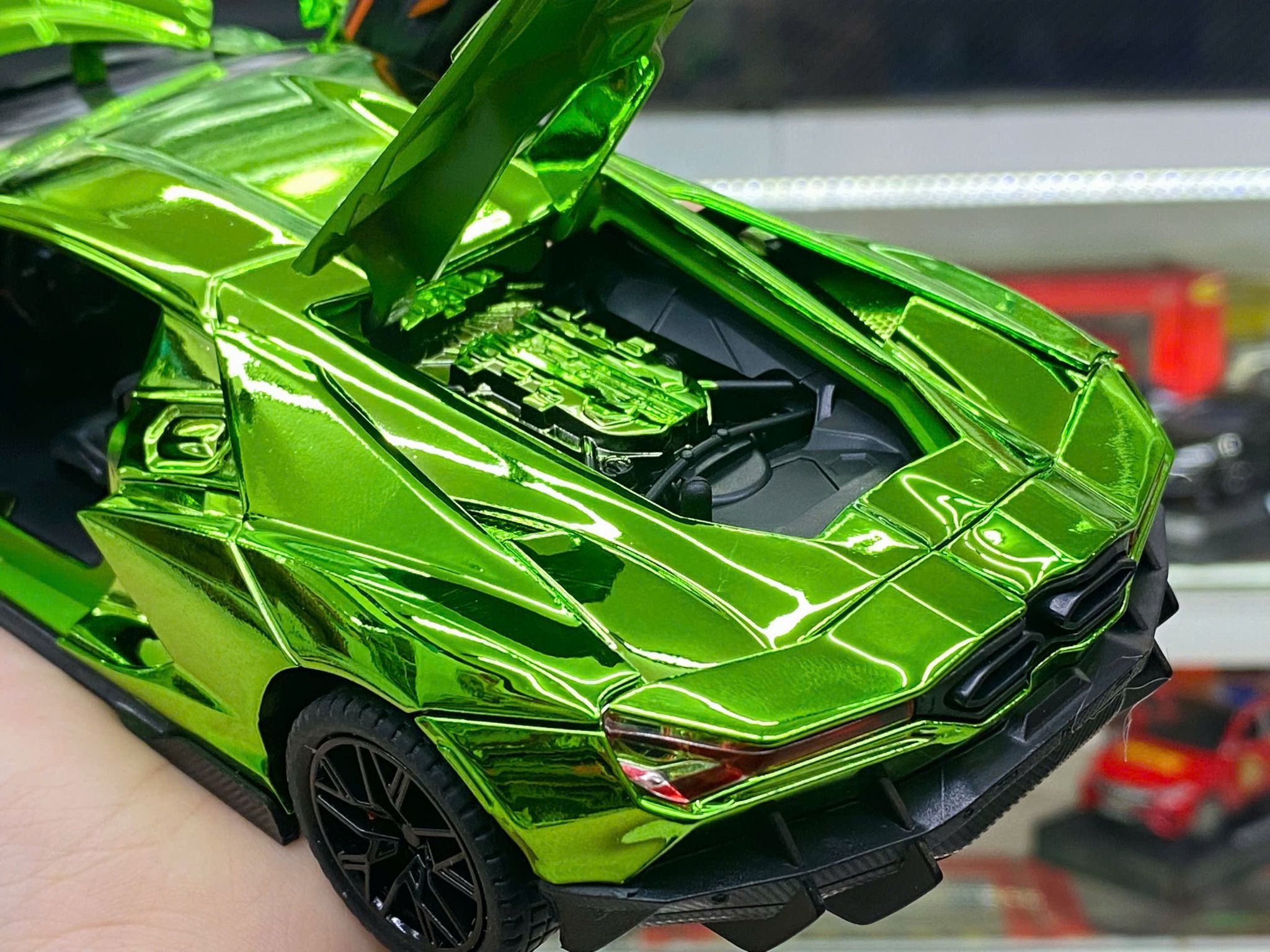 Mô hình xe Lamborghini Revuelto chrome color đánh lái được - full open - có đèn - âm thanh tỉ lệ 1:24 Alloy model OT24063