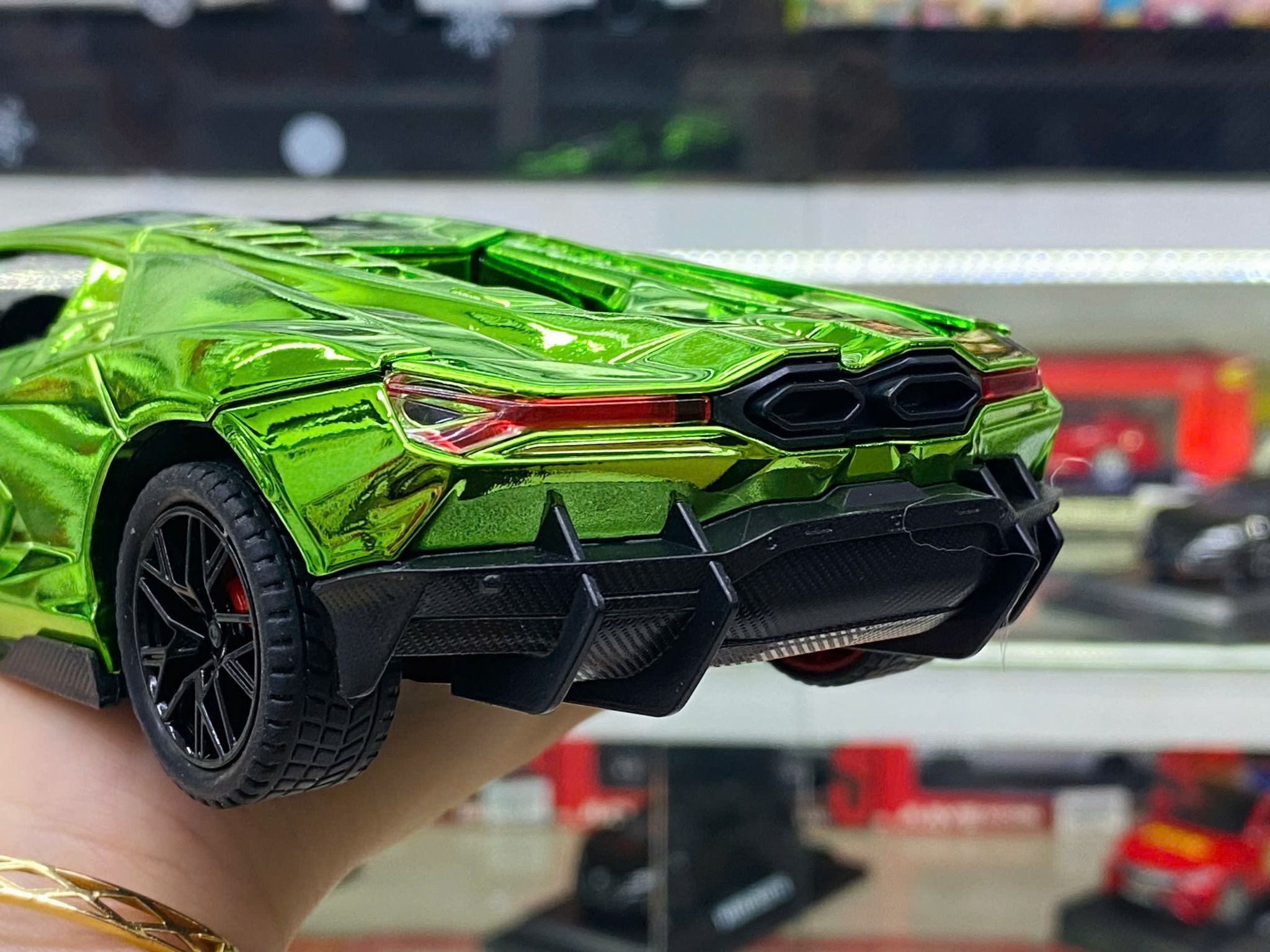 Mô hình xe Lamborghini Revuelto chrome color đánh lái được - full open - có đèn - âm thanh tỉ lệ 1:24 Alloy model OT24063