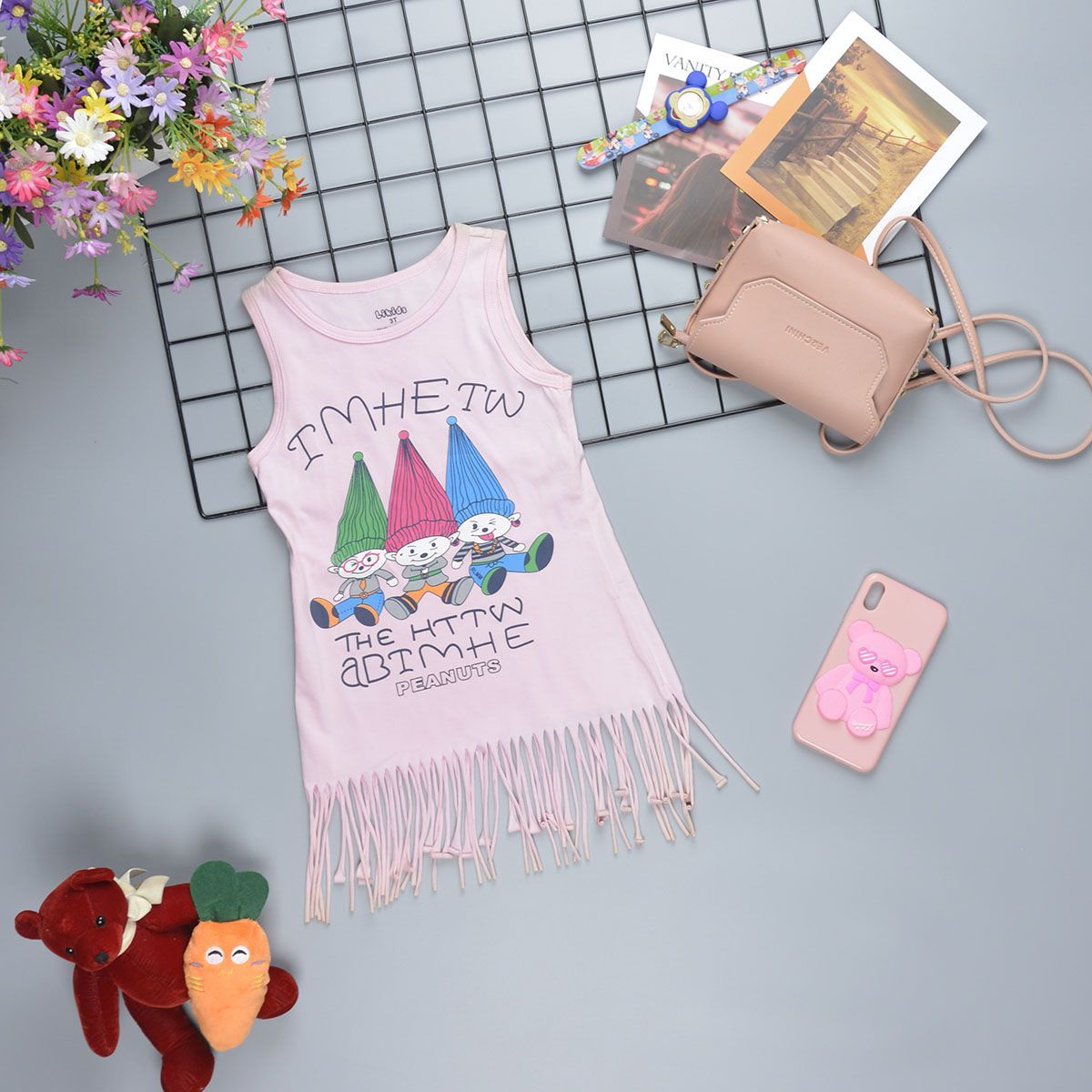 Đầm sát nách chân váy tua rua bohemian cho bé gái