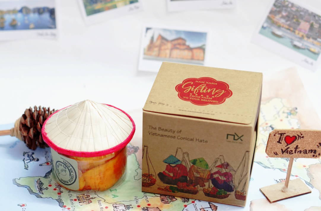 Lon nón lá - Xoài sấy phủ gấc 100g (140g)