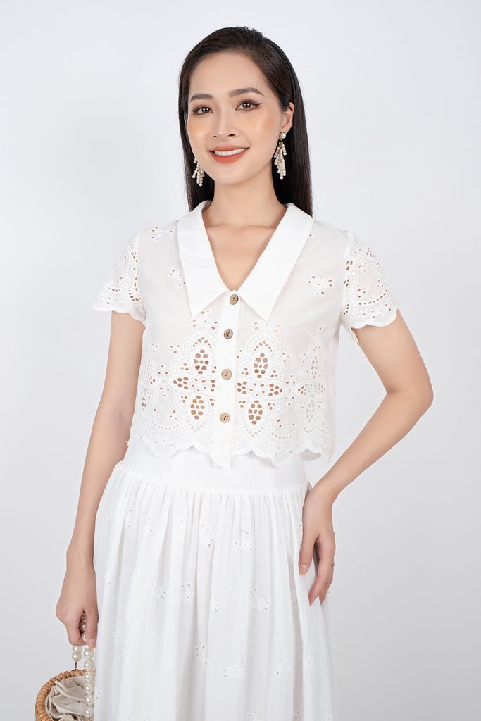 BJD32621 - Chân váy midi vải thô dáng xòe chân thêu họa tiết cạp sau chạy smocking - PANTIO