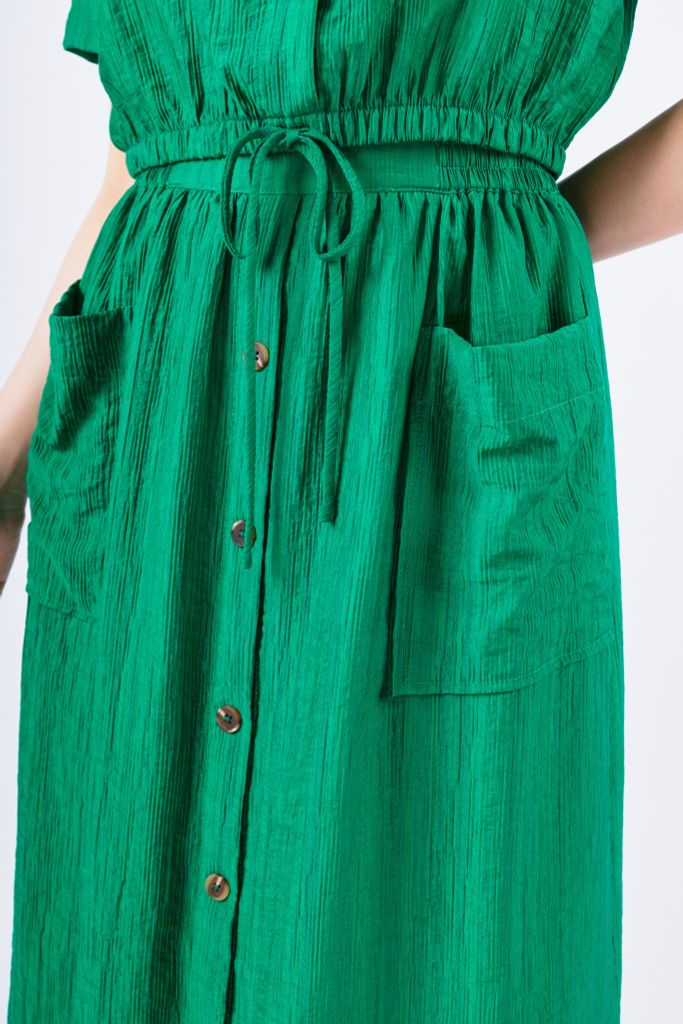 BJD33036 - Chân váy công sở vải thô mỏng dáng A có lót vải habutai thân đính cúc phối túi trang trí khóa thân sau - PANTIO