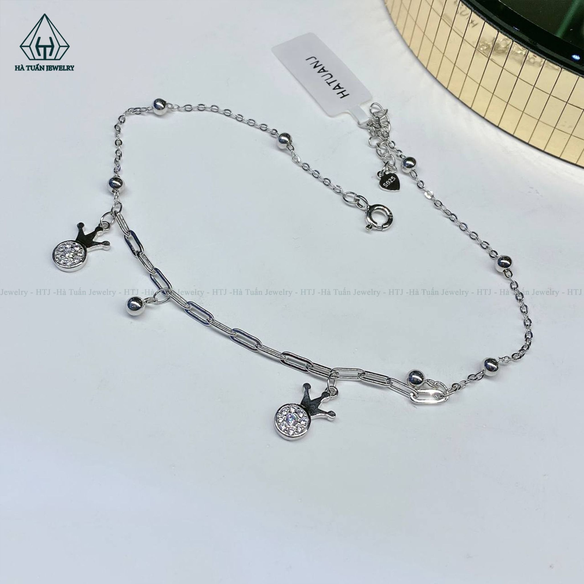 A364 Lắc chân vương miện