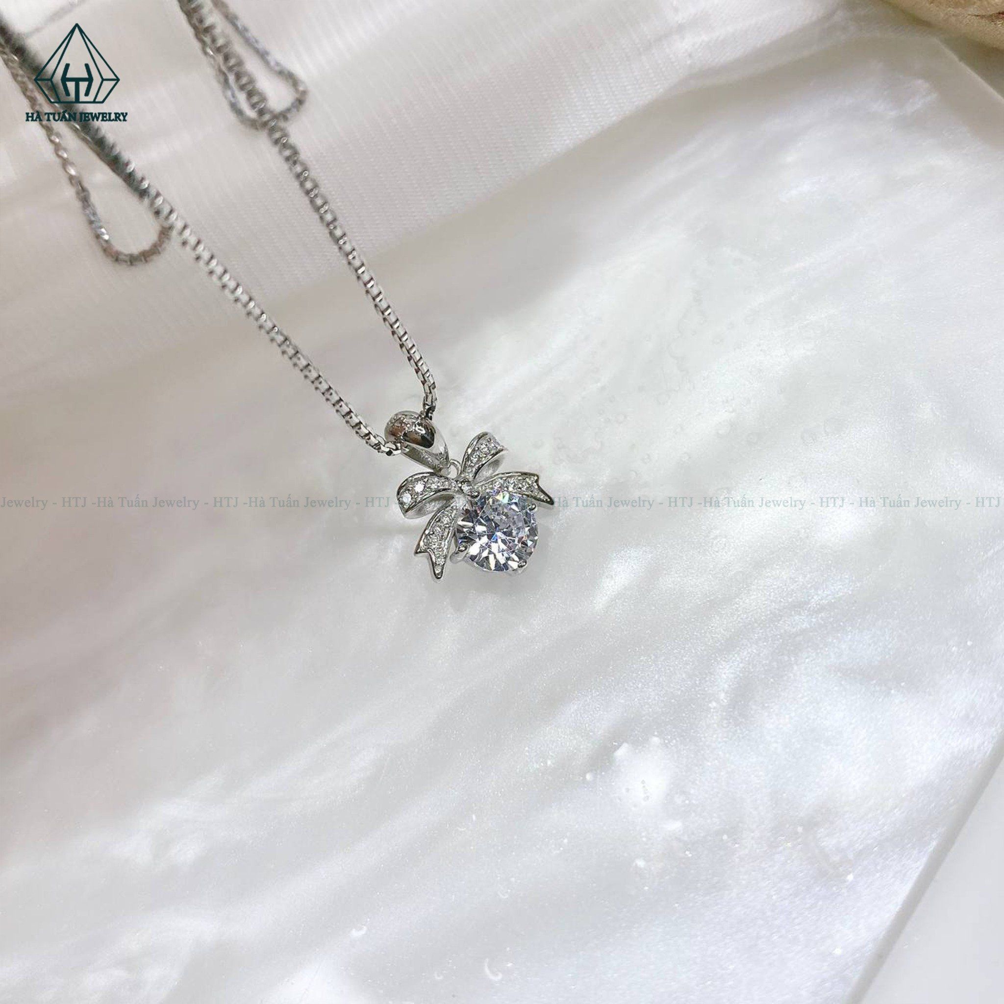 P368 Mặt dây nơ đính viên đá cz
