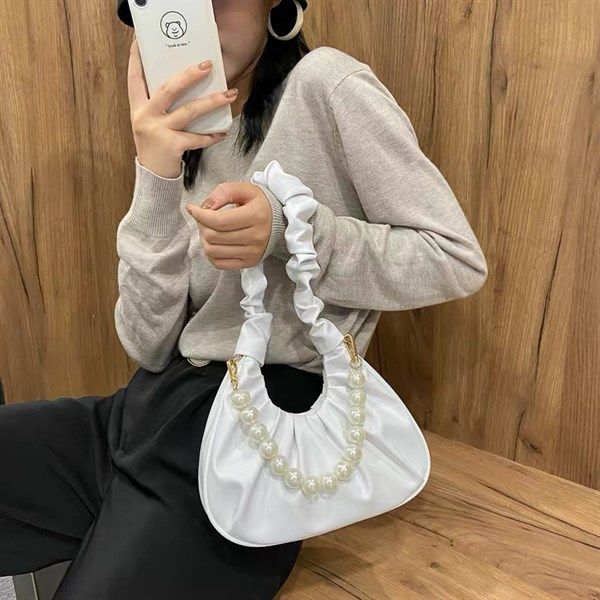 Túi da nhún phối dây ngọc trai to