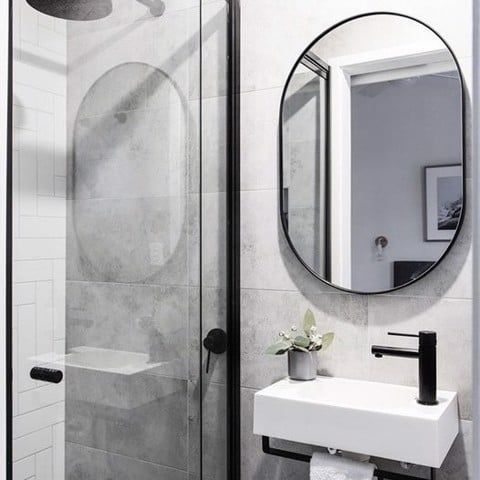 Gương oval phòng tắm viền théo đen 70x50cm