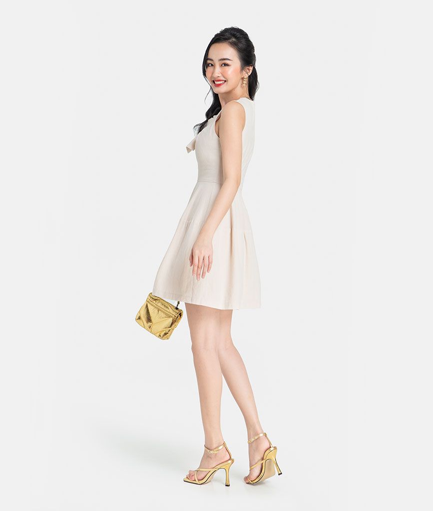 ĐẦM MINI XÒE XOẮN NƠ CỔ