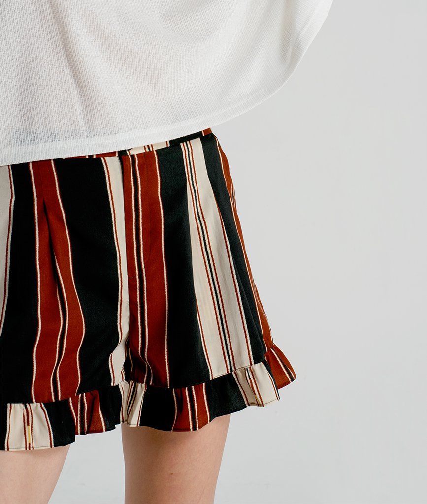 Quần short ống rộng thô bèo lai