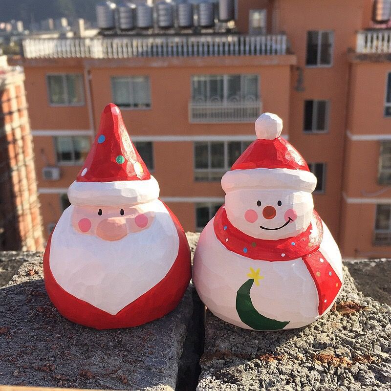 Santa, Người Tuyết Khắc Gỗ