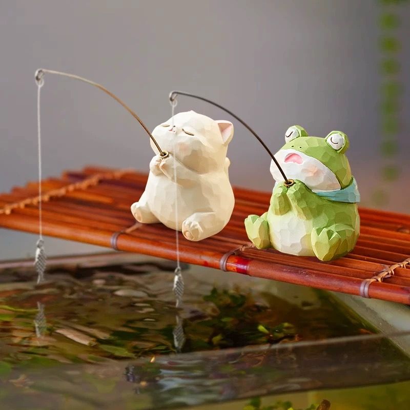 Mèo Ngồi Hoa Sen Câu Cá