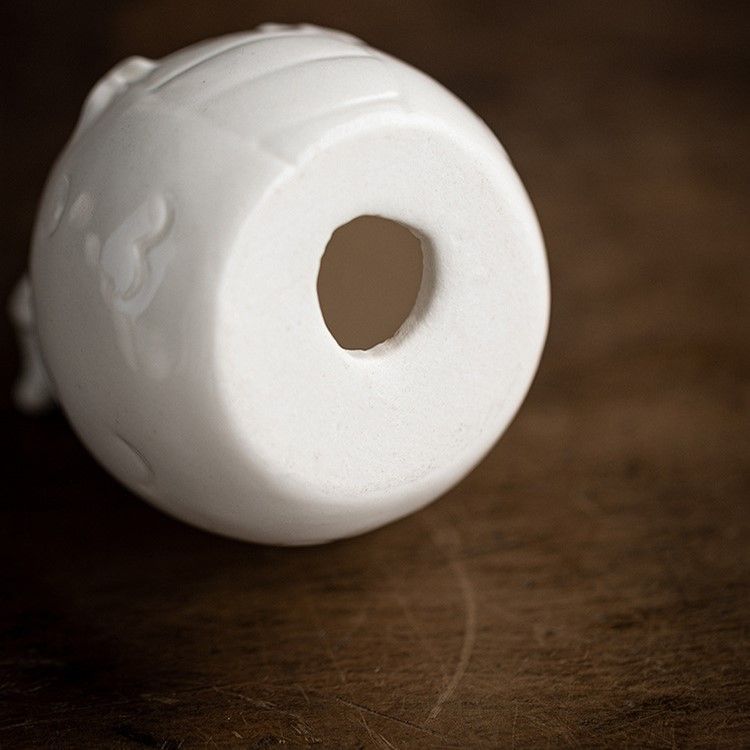 Tượng Sứ Rồng Má Đào