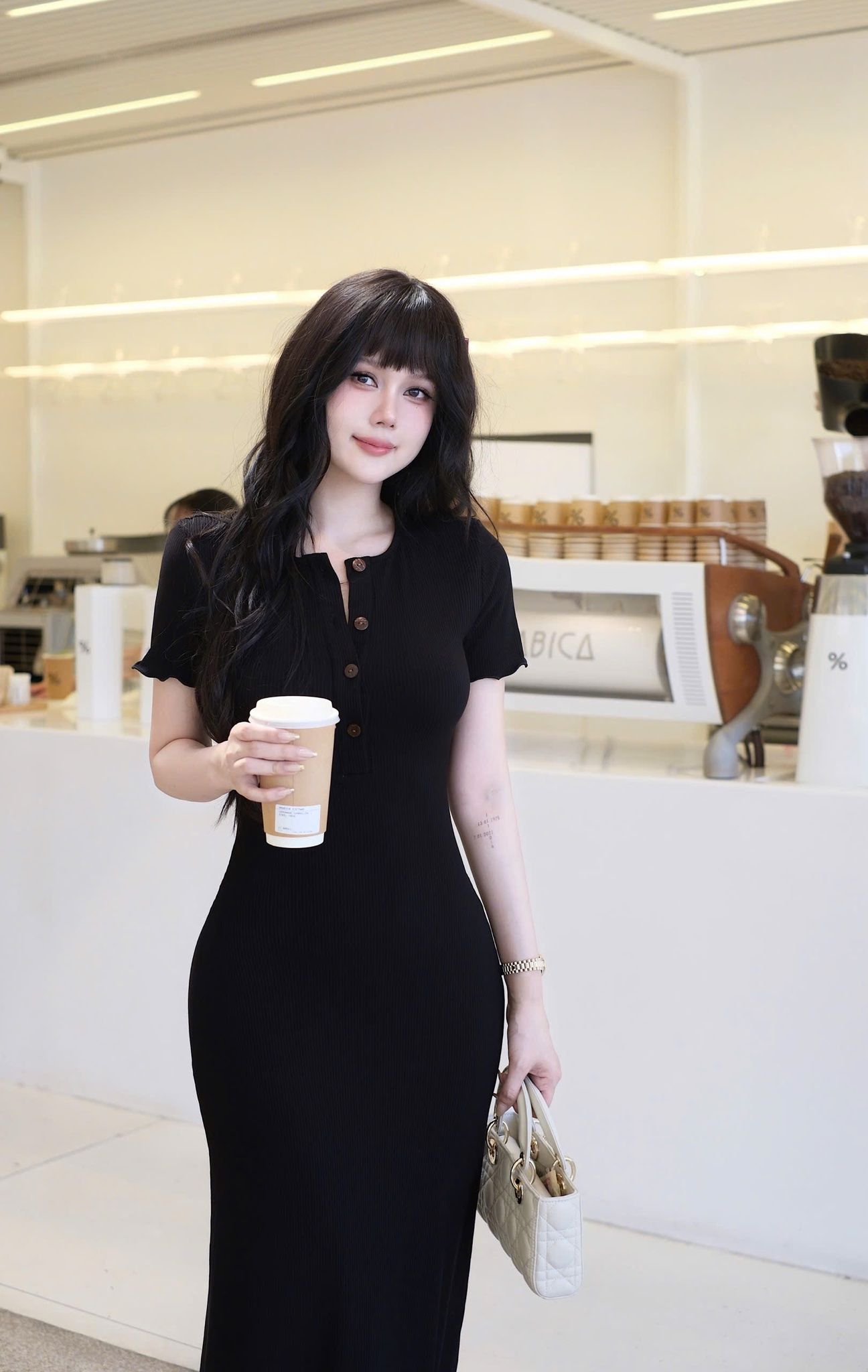 Đầm Thun Viền Bèo Tay Con