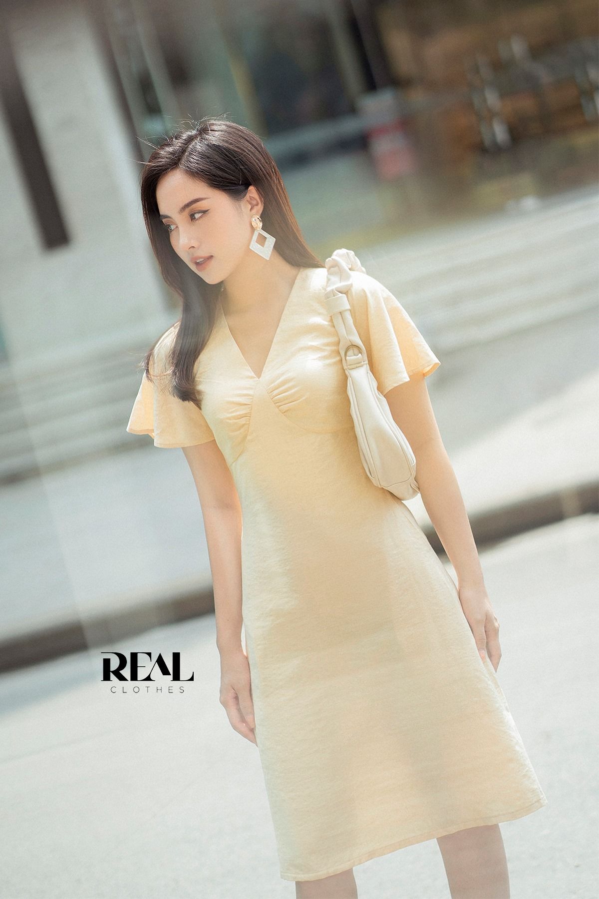 Đầm victoria kem