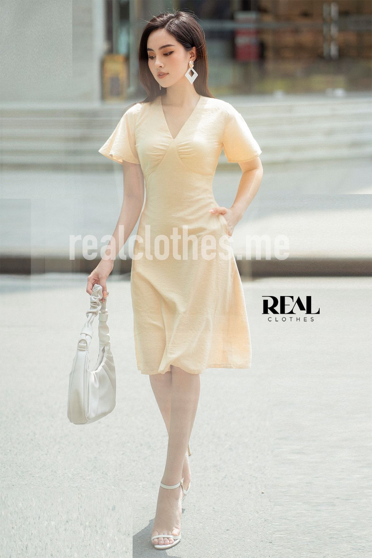 Đầm victoria kem