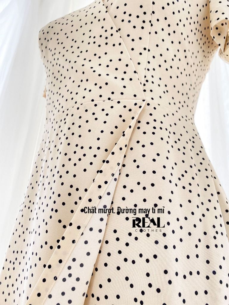 Đầm kyo chấm bi kem