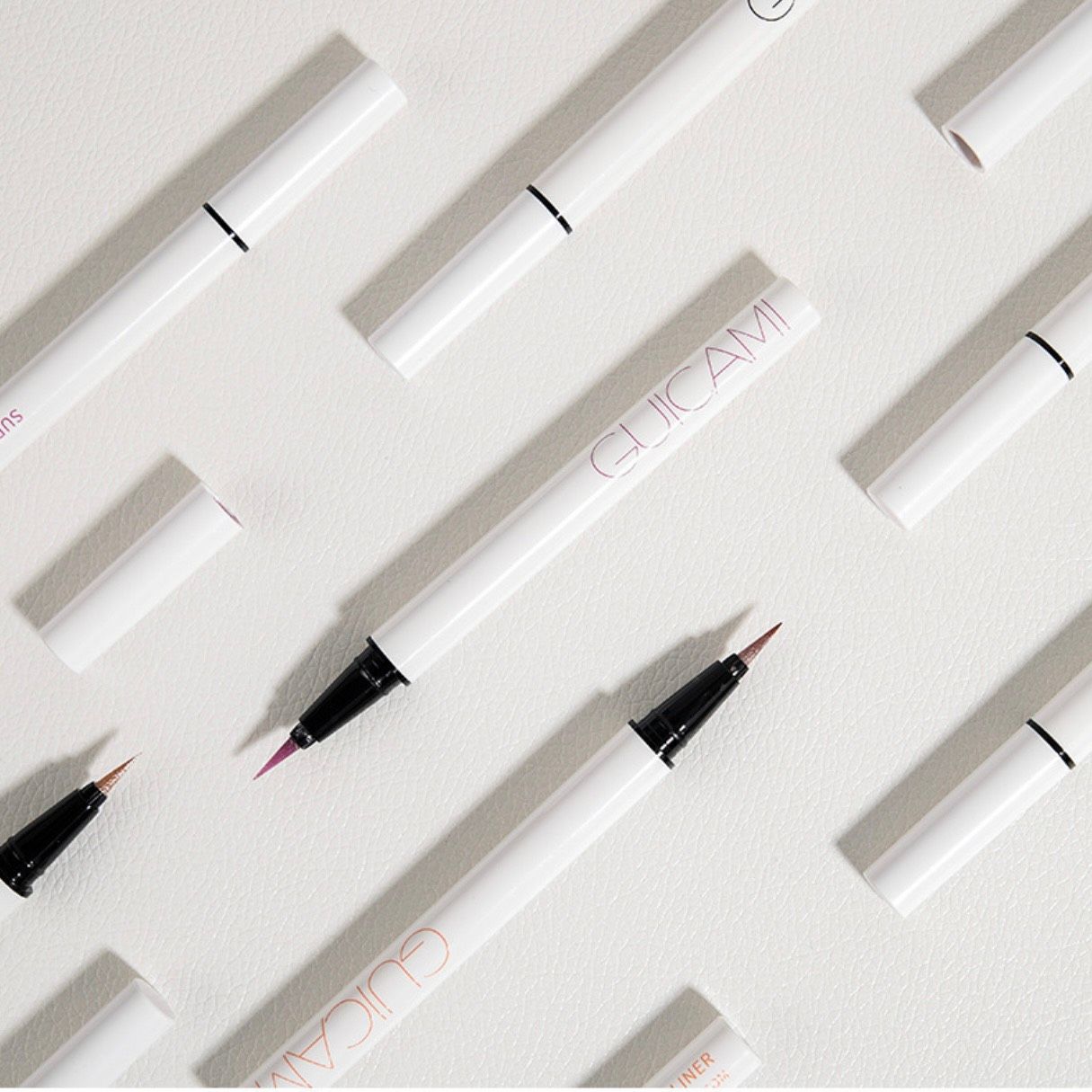 SUPERFINE SHIMMER LIQUID EYELINER BÚT NHŨ MÀU GUICAMI