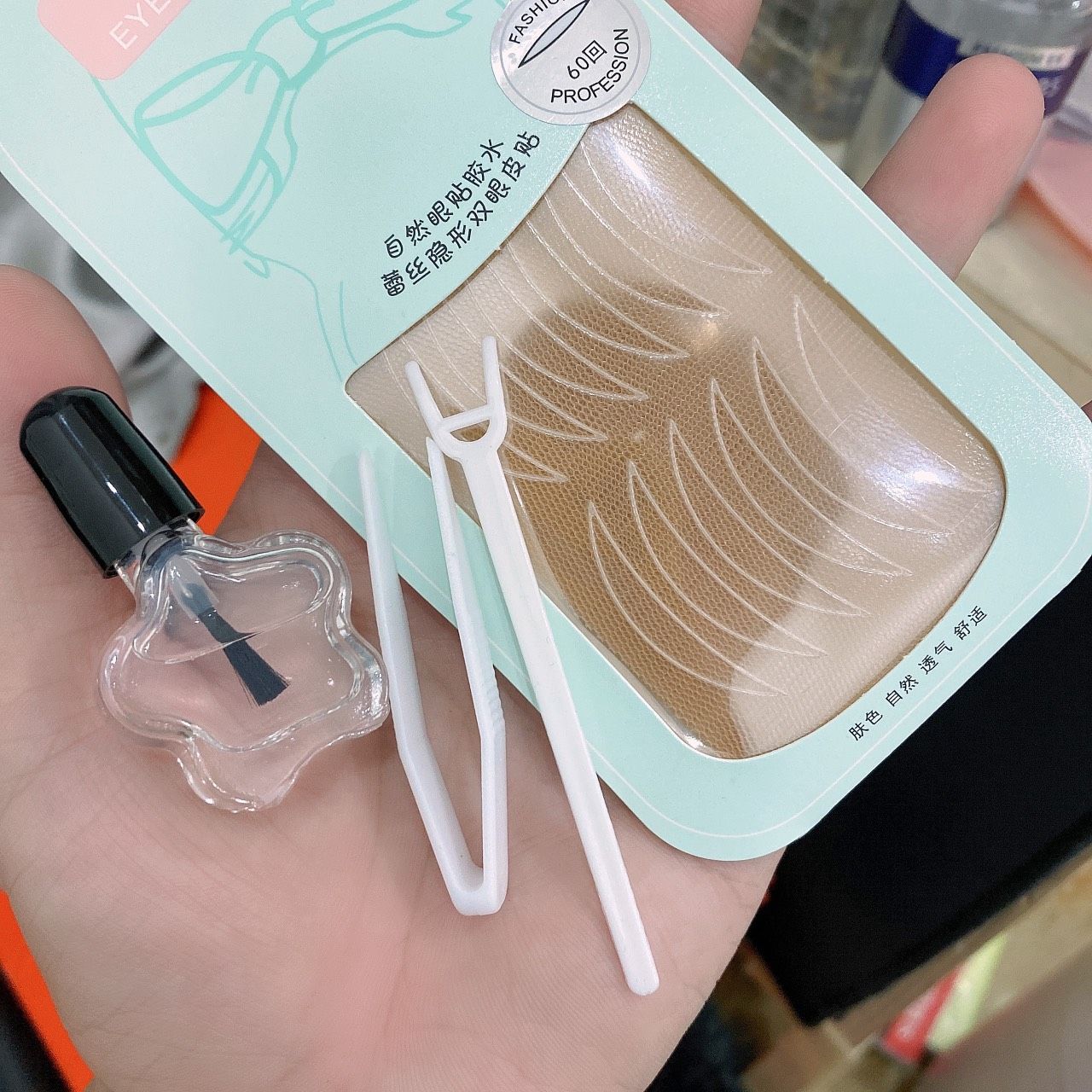 Kích mí lưới hộp nhựa Ribbon (tặng keo dán mí và cây nhấn mí)