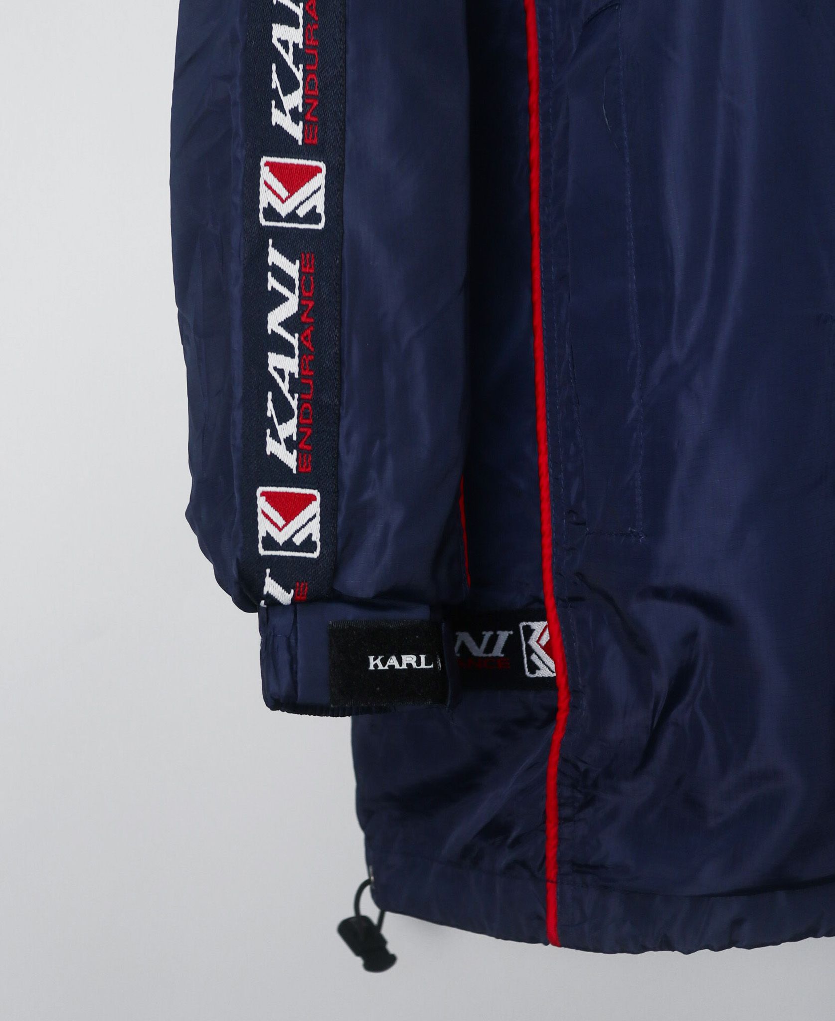 10.23.23 - VTG WINDBREAKER JACKET - KARL KANI JEANS