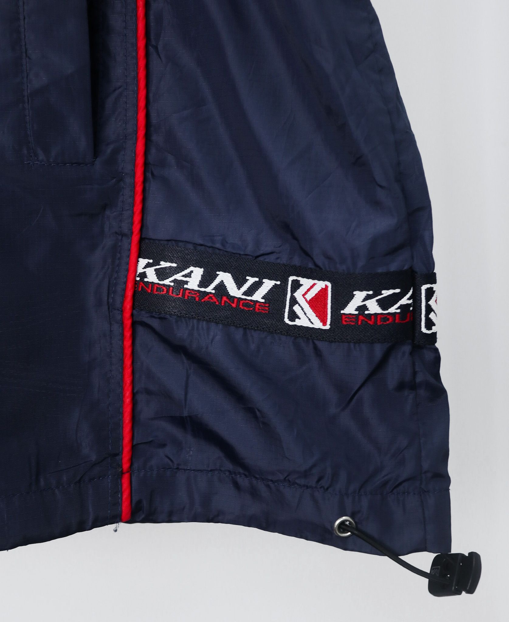 10.23.23 - VTG WINDBREAKER JACKET - KARL KANI JEANS